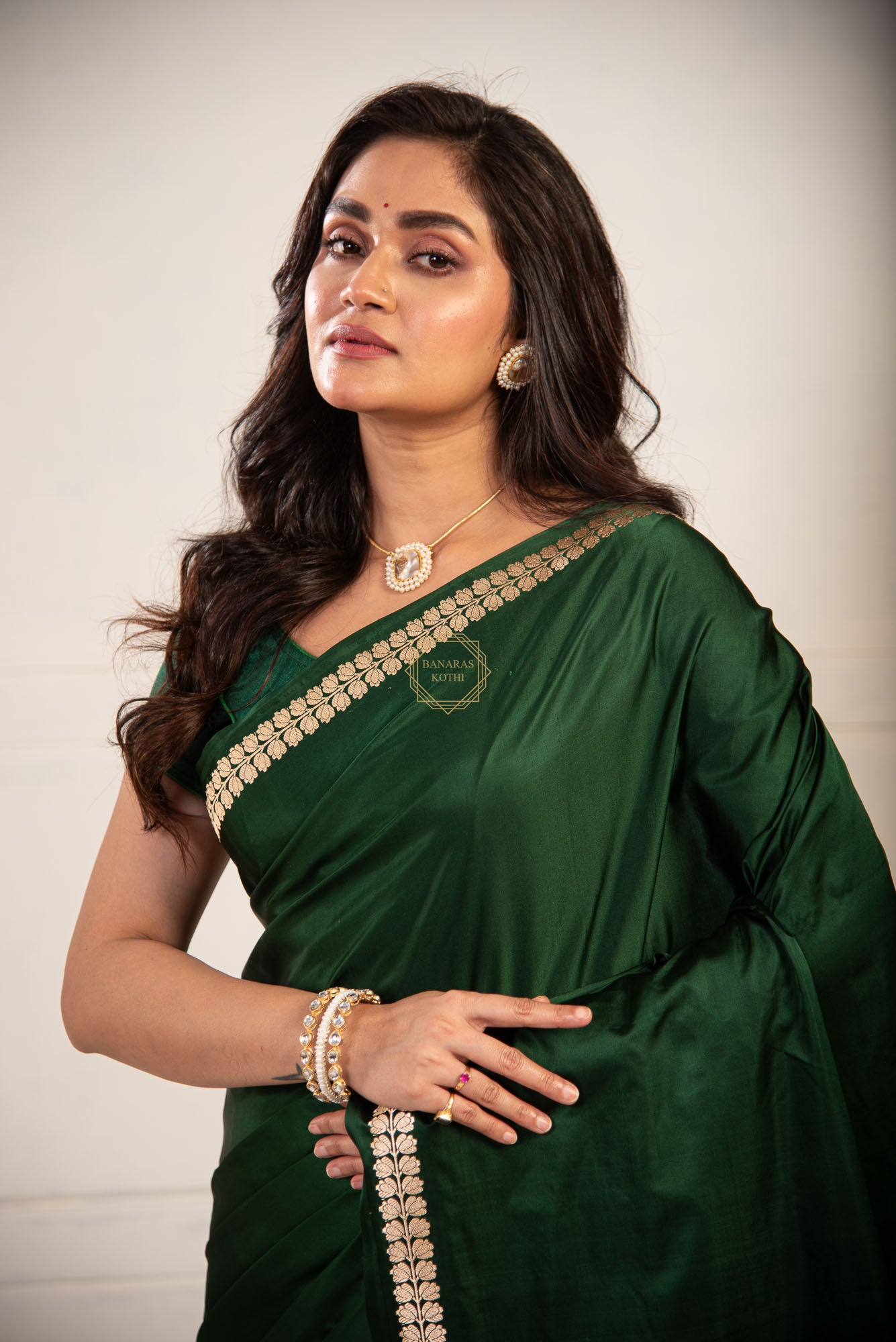 Kadhua Border Weaved on Plain Body of Satin Silk Saree