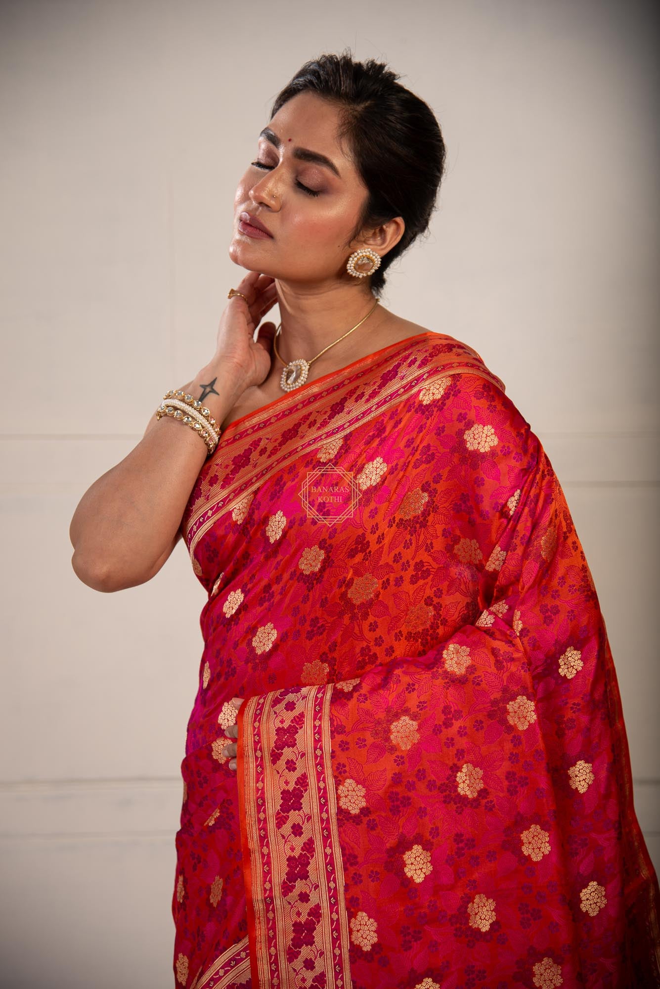 Resham and Zari Jaal Weaved on Satin with Jamawar Technique