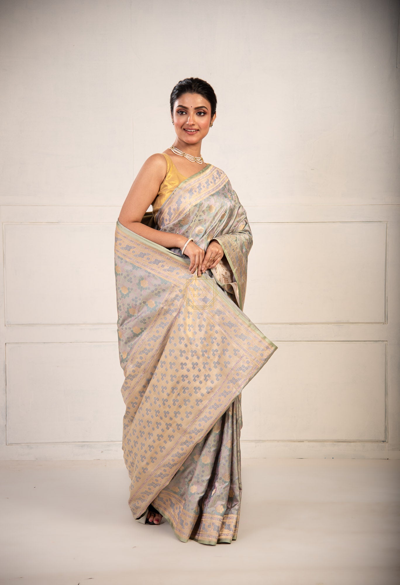 Resham and Zari Jaal Weaved on Satin with Jamawar Technique