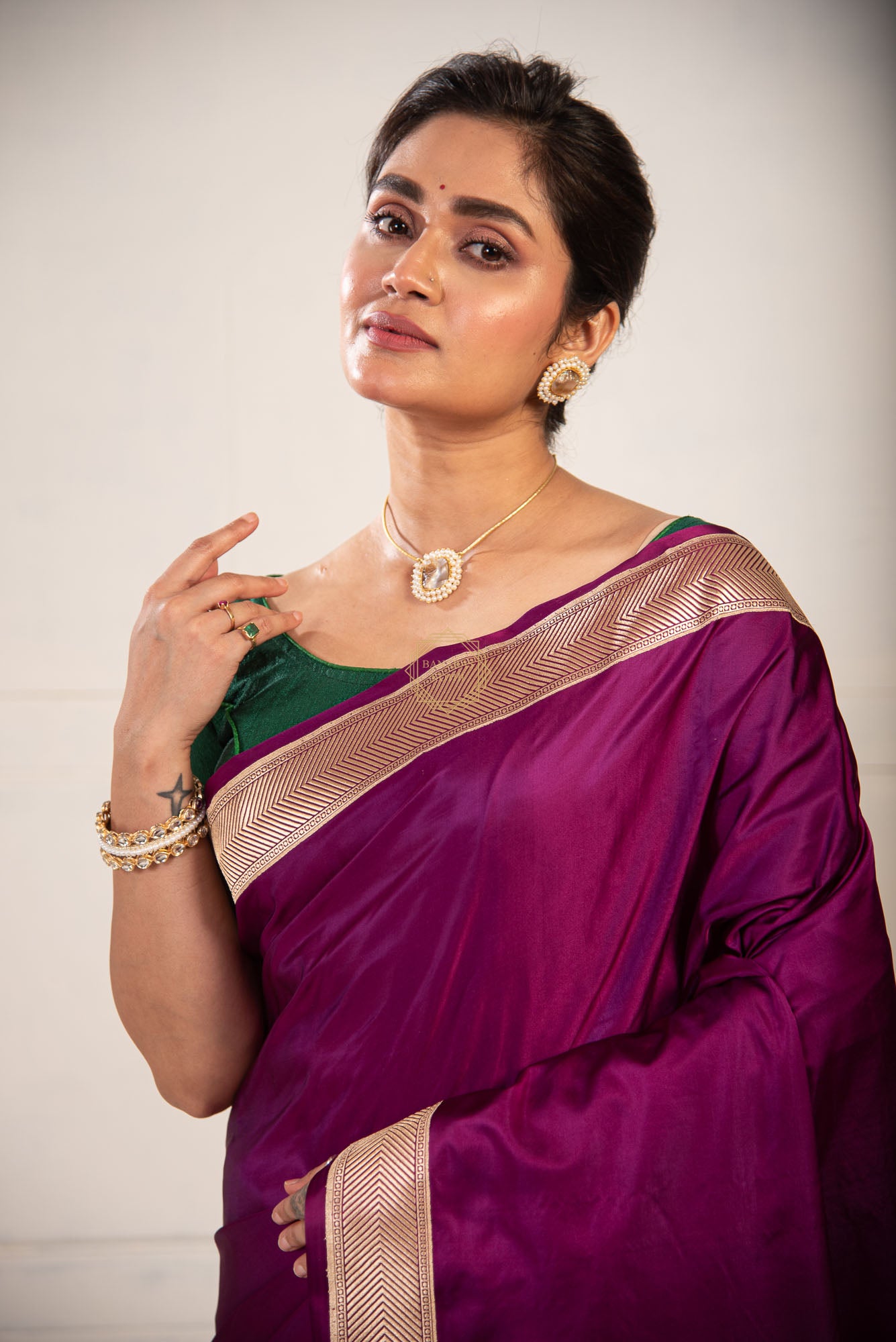 Kadhua Border Weaved on Plain Body of Satin Silk Saree