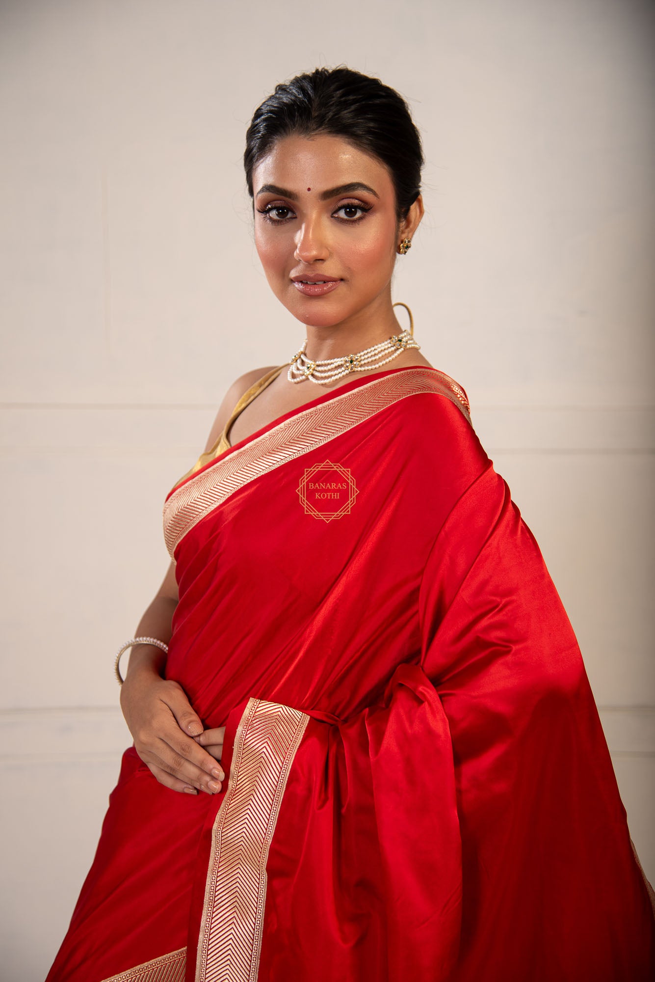 Kadhua Border Weaved on Plain Body of Satin Silk Saree